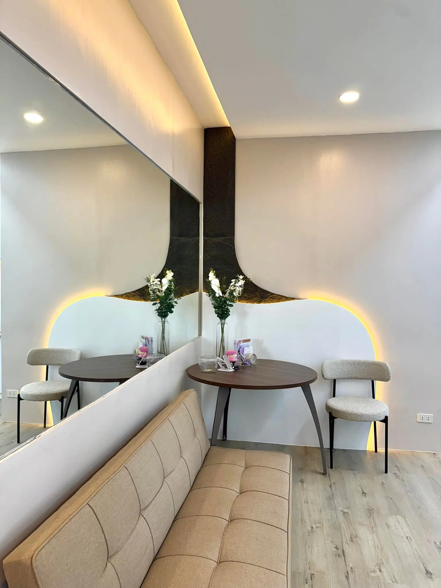 Warm, modern waiting area at DR. B. Dental Clinic